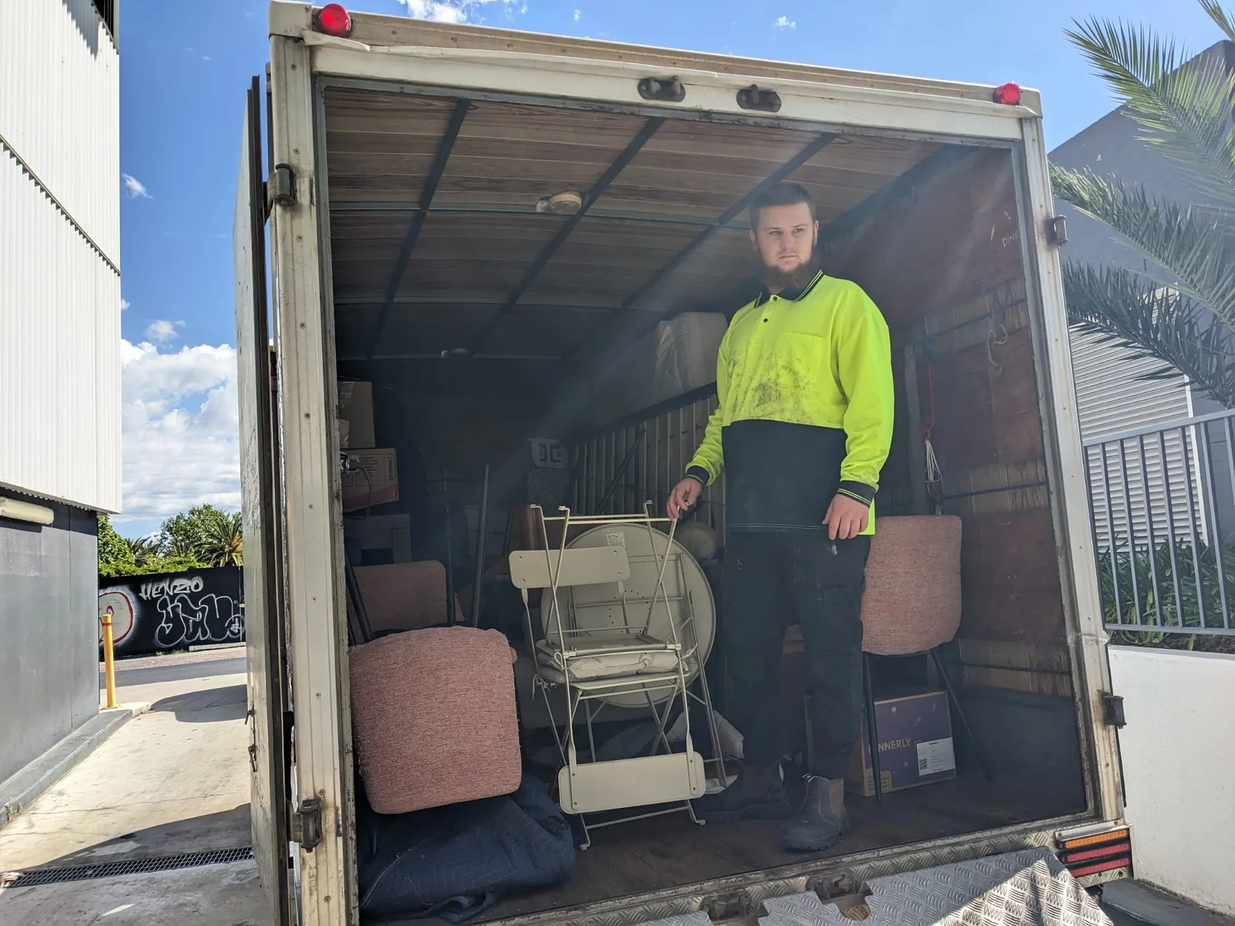 Safe Movers loading furniture into a moving truck